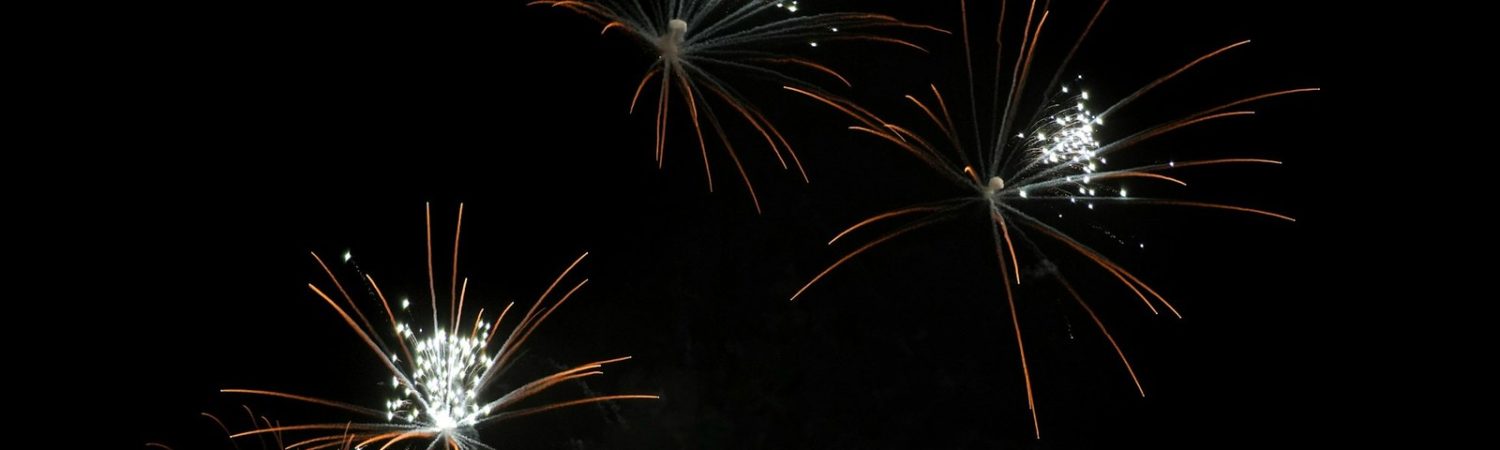Fireworks lighting up a dark sky for a New Year's resolutions article
